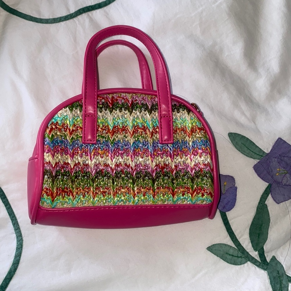 A link multi colored purse to set off any look you have 💗 just very cute